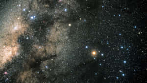 深空中帶有星星和宇宙塵埃雲的銀河系。 — 黑色星球 壁紙