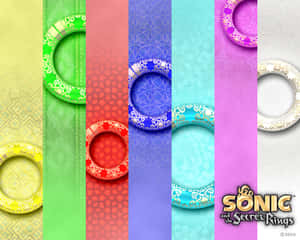 彩虹色的《Sonic the Secret Rings》遊戲戒指，帶有裝飾性圖案。 — 音速小子 壁紙