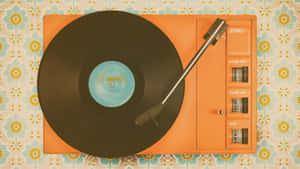 橙色復古唱盤，旋轉中的黑膠唱片，花卉背景。 — 復古90年代風格 壁紙