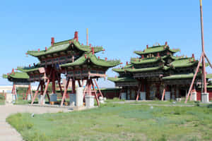 傳統中國寺廟，綠色屋頂和紅色柱子，藍天下。 — 城堡動畫 壁紙