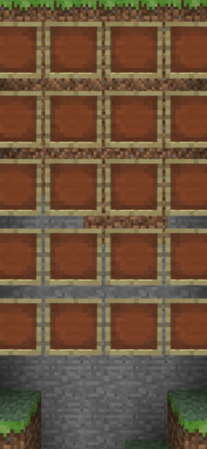 Minecraft泥土方塊在網格中，下方有石頭和草方塊。 — iPhone 16e 壁紙