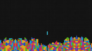 像素化俄羅斯方塊遊戲，彩色方塊在黑色網格背景上落下。 — Canva 壁紙