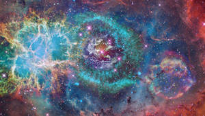 色彩繽紛的宇宙星雲，帶有發光的氣體和深空中閃爍的星星。 — 宇宙 壁紙