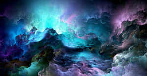 色彩繽紛的宇宙星雲，在太空中旋轉著藍綠色和紫色的雲層。 — 海灘日落 壁紙