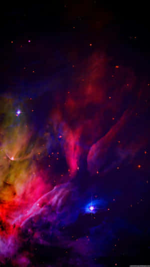 在深空中帶有發光星體的充滿活力的宇宙星雲。 — 4K iPhone 壁紙