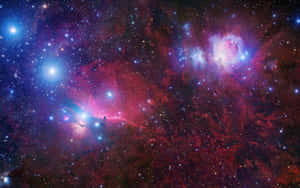 色彩繽紛的星雲和星星充滿了深空的廣闊。 — 星星 壁紙