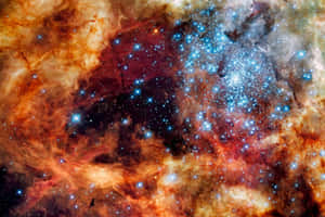 色彩繽紛的星雲，充滿了發光的恆星和深空中的宇宙塵埃雲。 — 宇宙 壁紙