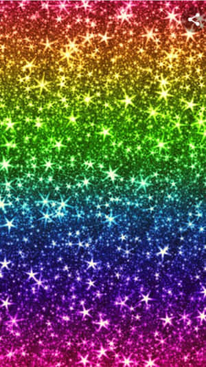 充滿活力的彩虹漸變，螢幕上閃爍著星星。 — 彩虹美學 壁紙