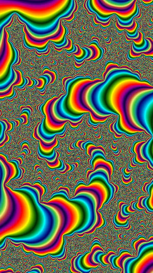 充滿活力的彩虹漩渦在紋理深色背景上以催眠的碎形圖案漣漪。