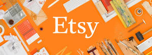 Etsy 標誌被手工工具和藝術用品包圍在橙色背景上。 — 辦公室 壁紙