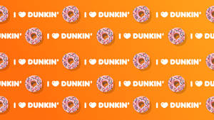 橙色背景，重複排列粉紅色糖霜甜甜圈和 I heart Dunkin' 文字。 — Dunkin Donuts 壁紙