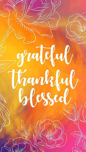 在彩色漸變背景上，帶有花卉輪廓的 grateful thankful blessed 文字。 — 語錄 壁紙