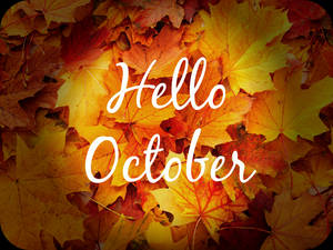 溫暖色調的秋葉，配上hello october文字。 — 柳橙 壁紙