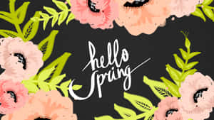 Hello Spring 文字被粉紅色花朵和綠色葉子包圍，背景為深色 — 光環 壁紙