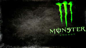 Monster Energy標誌在深色紋理背景上發出綠色光芒 — 魔物獵人 壁紙