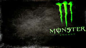 深色紋理牆上明亮的綠色Monster Energy標誌。 — Monster Energy 壁紙