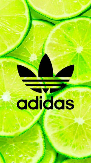 鮮綠色萊姆片，帶有黑色Adidas標誌和文字。 — 愛迪達 GIF 壁紙
