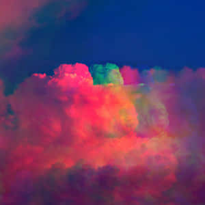 超現實的霓虹雲在深藍色天空背景下發出粉紅、綠色和紫色的光芒。 — 美學粉色GIF 壁紙
