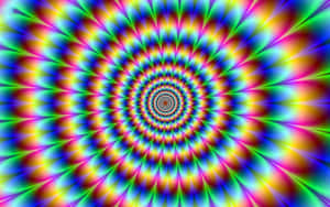 充滿活力的彩虹螺旋營造出催眠隧道效果。 — 幻覺 壁紙