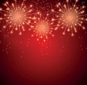 金色煙火在深紅色的夜空中爆炸，閃爍著節日能量。 — 慶祝 壁紙
