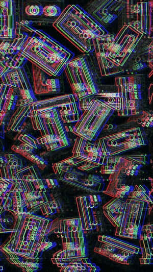 霓虹發光的卡式帶散落在數位故障圖案中。 — 垃圾美學 壁紙