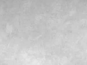 光滑淺灰色紋理牆壁，帶有細微斑駁圖案。 — 漸層 壁紙