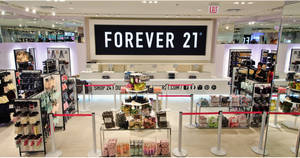 Forever 21服裝店，設有貨架和收銀台。 — 永遠21 壁紙