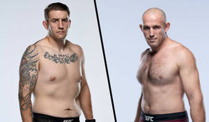 兩位赤裸上身的男性UFC拳手在攝影棚中嚴肅擺姿勢 — 運動 壁紙