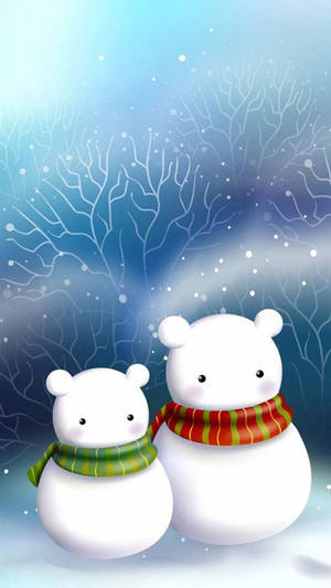 兩個戴著圍巾的雪人在雪白的冬季景觀中。 — 酷寒冬季 壁紙