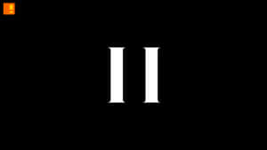 黑色背景上的兩個白色羅馬數字 II，左上角有一個橙色標誌。 — 羅曼·雷恩斯 壁紙