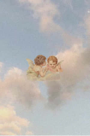 兩個天使小孩在寧靜天空中的蓬鬆雲朵上接吻。 — 天使 GIF 壁紙