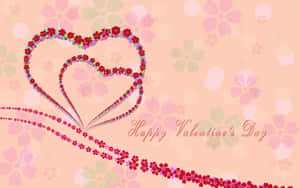 兩個交織的花卉心形，帶有「Happy Valentine's Day」文字，置於粉彩背景上。 — 16:10 壁紙