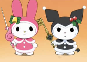 My Melody 和 Kuromi 穿著節日服裝拿著鑰匙 — 搞笑聖誕 壁紙
