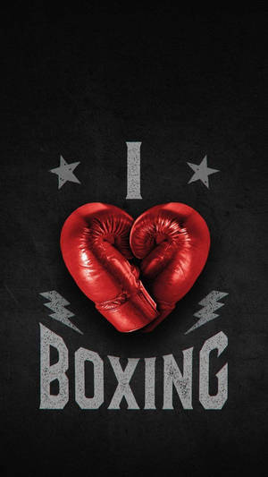 紅色拳擊手套形成心形，帶有「I ❤️ BOXING」文字，深色背景。 — 拳擊 壁紙