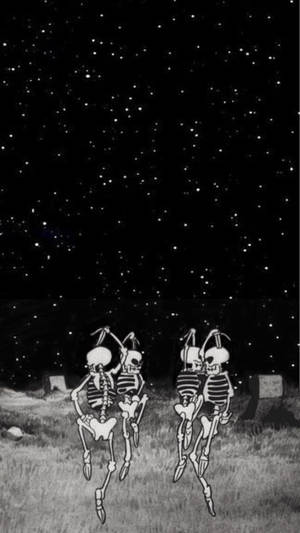 兩個骷髏在星空下的墓地上跳舞。 — 骷髏迷因 壁紙