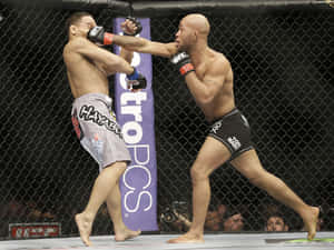 兩名MMA拳手在UFC八角籠內互相出拳。 — 運動 壁紙