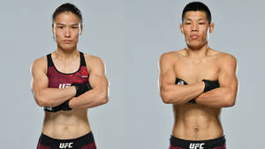兩名UFC拳手在攝影棚中交叉雙臂擺姿勢。 — 運動 壁紙