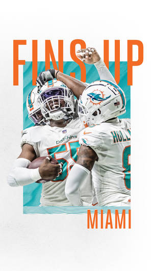 邁阿密海豚隊美式足球員以 'FINS UP' 文字慶祝達陣。 — 邁阿密海豚 壁紙