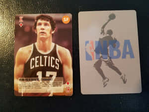 兩張NBA球星卡，一張有塞爾提克球員，另一張有灌籃剪影。 — 運動 壁紙