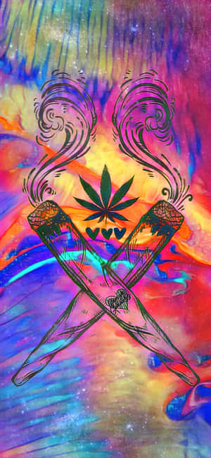 兩支交叉的大麻煙，煙霧裊裊升起，背景是色彩繽紛的宇宙紮染圖案。 — 大麻 壁紙