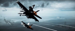 兩架戰鬥機在遠處有航空母艦的情況下飛越海洋。 — 電玩遊戲 GIF 壁紙