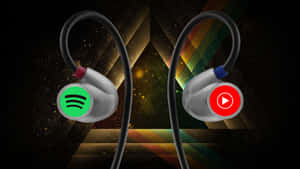印有Spotify和YouTube標誌的時尚入耳式耳機，背景為宇宙彩虹。 — Spotify 壁紙