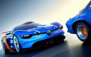 兩輛藍色 Alpine-Renault 賽車，帶有橙色點綴，在反光賽道上。 — Mercedes Benz C300 壁紙