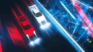 兩輛高速跑車在夜晚霓虹浸染的高速公路上奔馳。 — 霓虹 壁紙