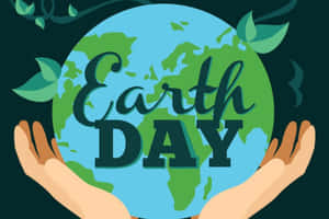 手捧地球儀，帶有Earth Day文字和葉子 — 世界地球日 壁紙