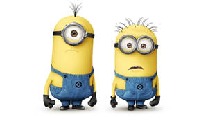 兩隻黃色卡通Minions，身穿藍色吊帶褲和護目鏡，表情豐富。
