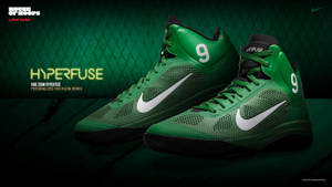 帶有白色勾勾和數字9的綠色Nike Hyperfuse籃球鞋。 — 1600x900 壁紙