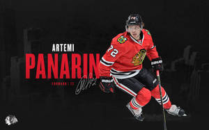 Artemi Panarin Blackhawks 冰球運動員在行動中，帶有球隊標誌和簽名。 — 運動 壁紙