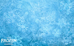 帶有雪花圖案和迪士尼冰雪奇緣標誌的冰藍色冰面。 — 冬季風景 壁紙