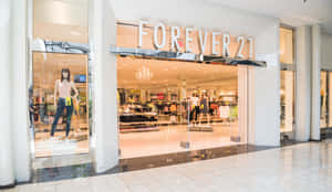Forever 21服裝店入口，內部有人體模型和購物者。 — 永遠21 壁紙